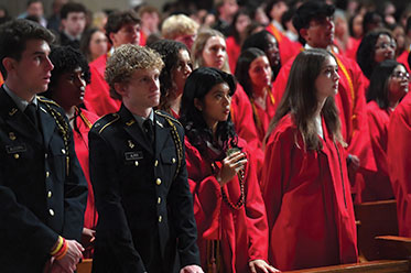 Graduating students standing together. Links to Gifts of Cash, Checks, and Credit Cards
