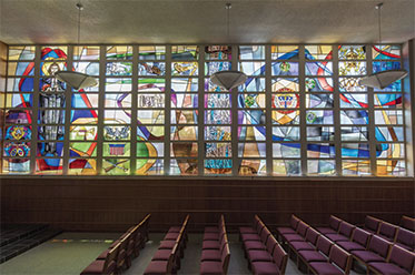 Photo of stained glass in a chapel. Link to Life Stage Gift Planner Ages 60-70 Situations.